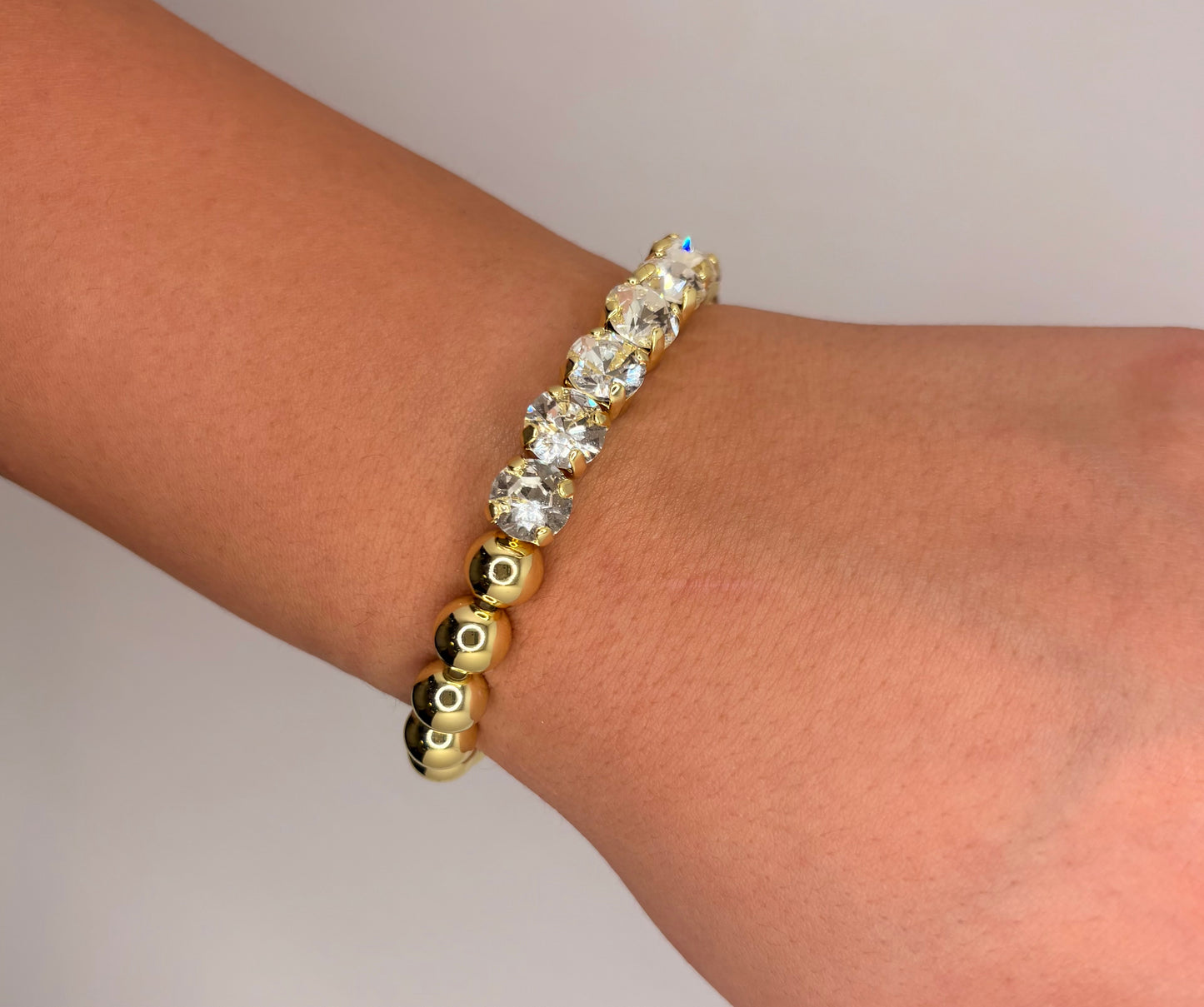 Half Clear Crystal 10k Gold Plated Stretch Bracelet, 7in