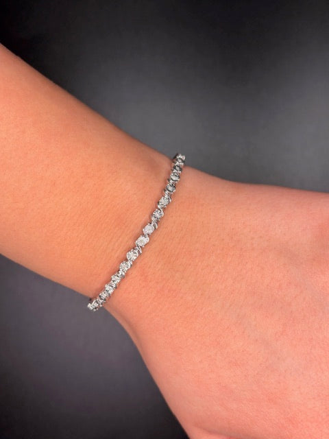 Sterling Silver Infinity Wave Natural Diamond Tennis Bracelet