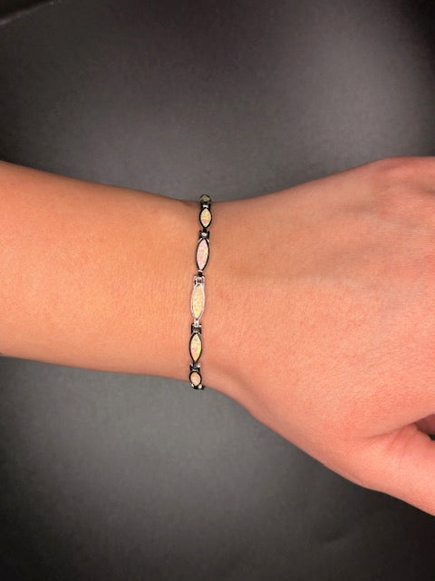 Sterling Silver Lab Grown Pink Opal Oval Bar Bracelet