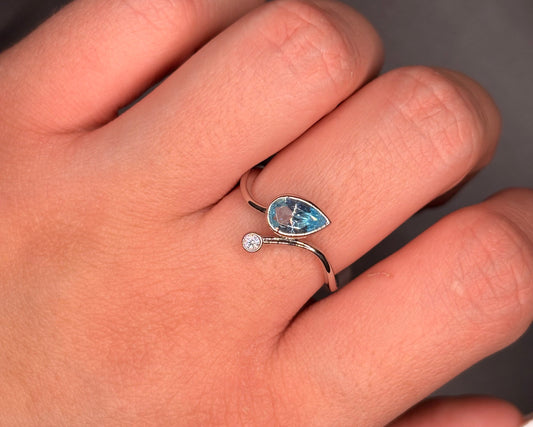 Sterling Silver Sky Blue Topaz Cz Twist Ring